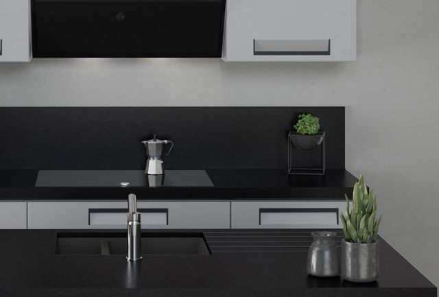 Inselküche mit schwarzer Natursteinarbeitsplatte - Marquardt Küchen